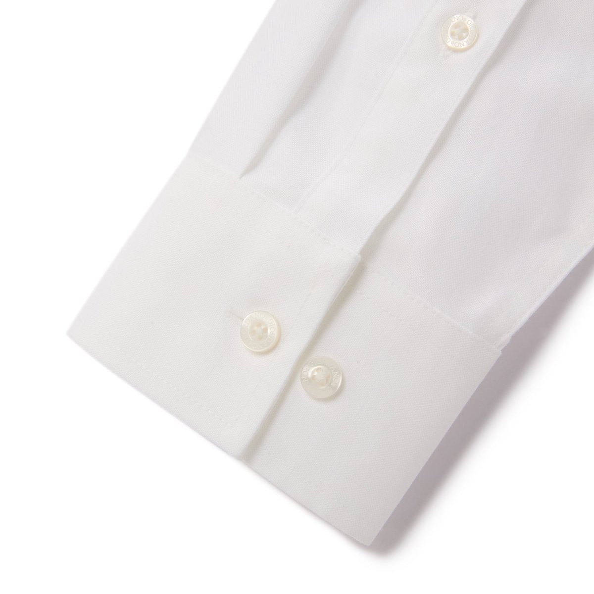 Giordano white wrinkle free cotton shirt for men showing close-up of cuff with buttons