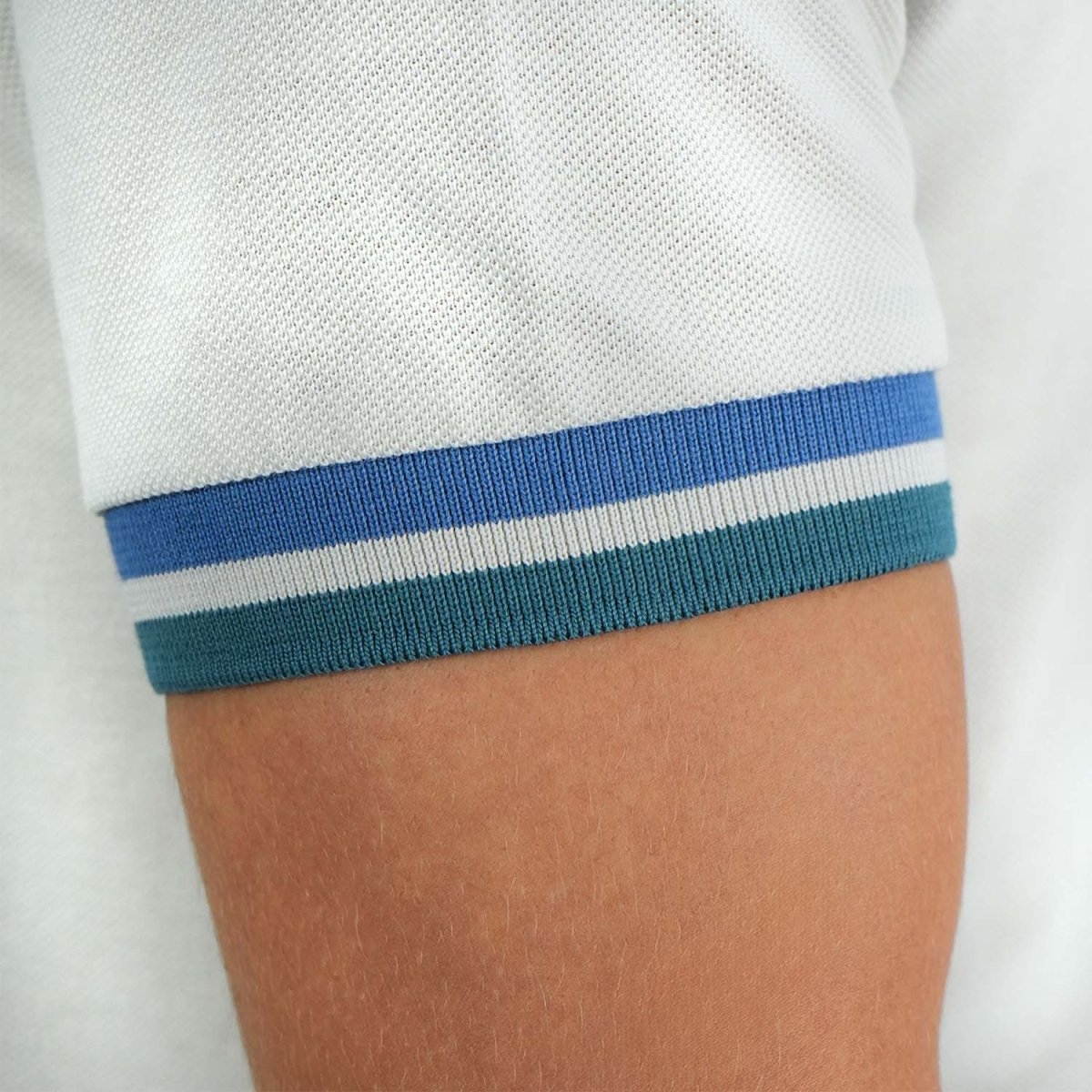 Men's Performance Polo: Classic Piqué, Tipped Collar, Embroidered Detail - Giordano