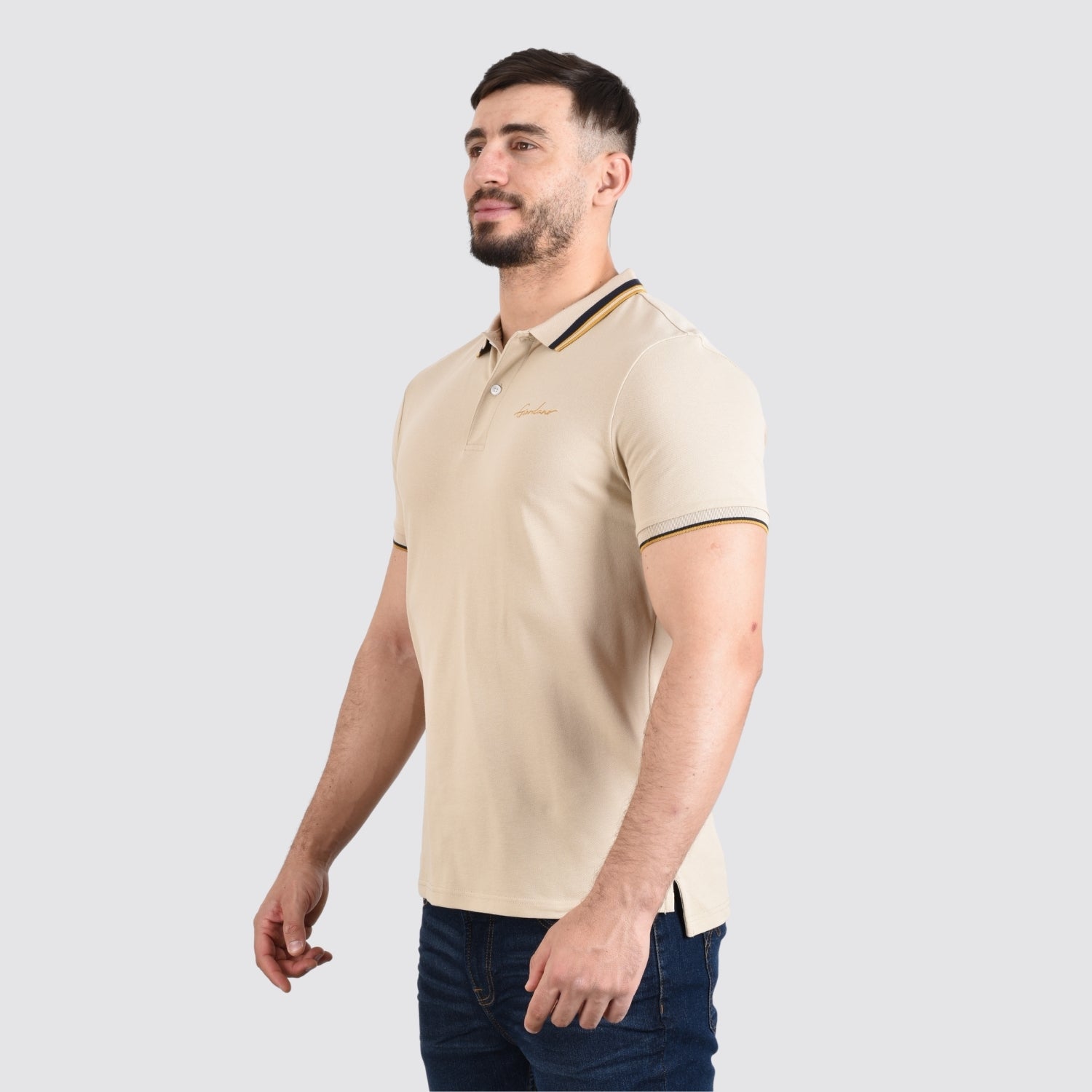 قميص بولو رجالي من القطن بقصّة Slim Fit مع تطريز على شكل قارب شراعي
