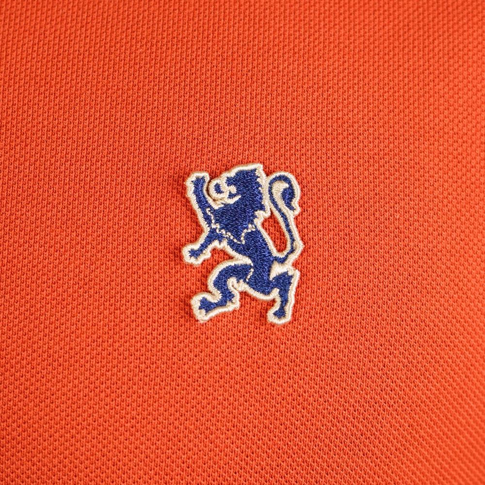 Men’s Cotton Slim Performance Polo with Small Lion Embroidery
