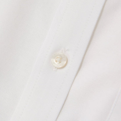 Giordano white wrinkle free cotton shirt for men close-up showing button and fabric texture